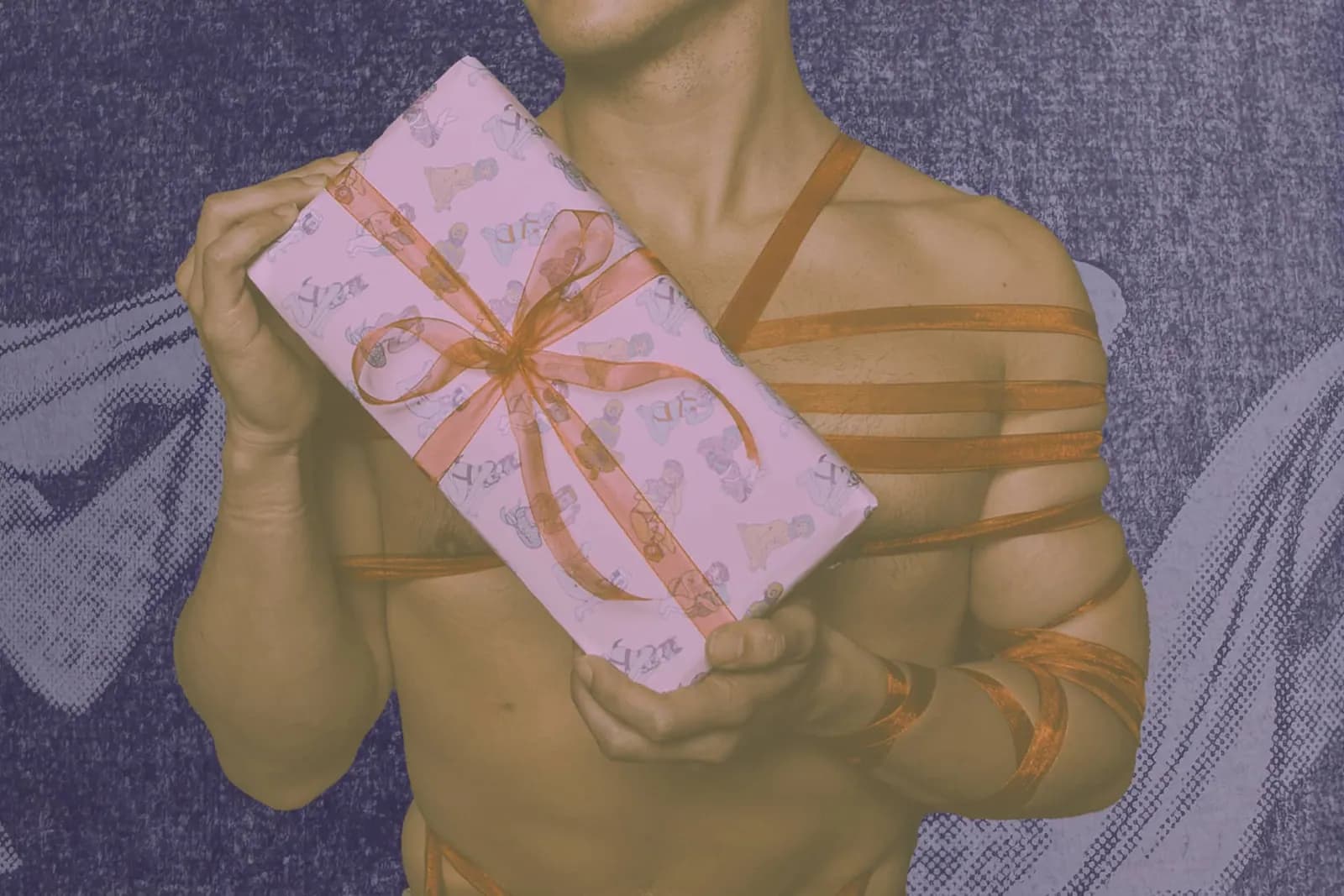 man tied in rope holding a present with a red bow.
