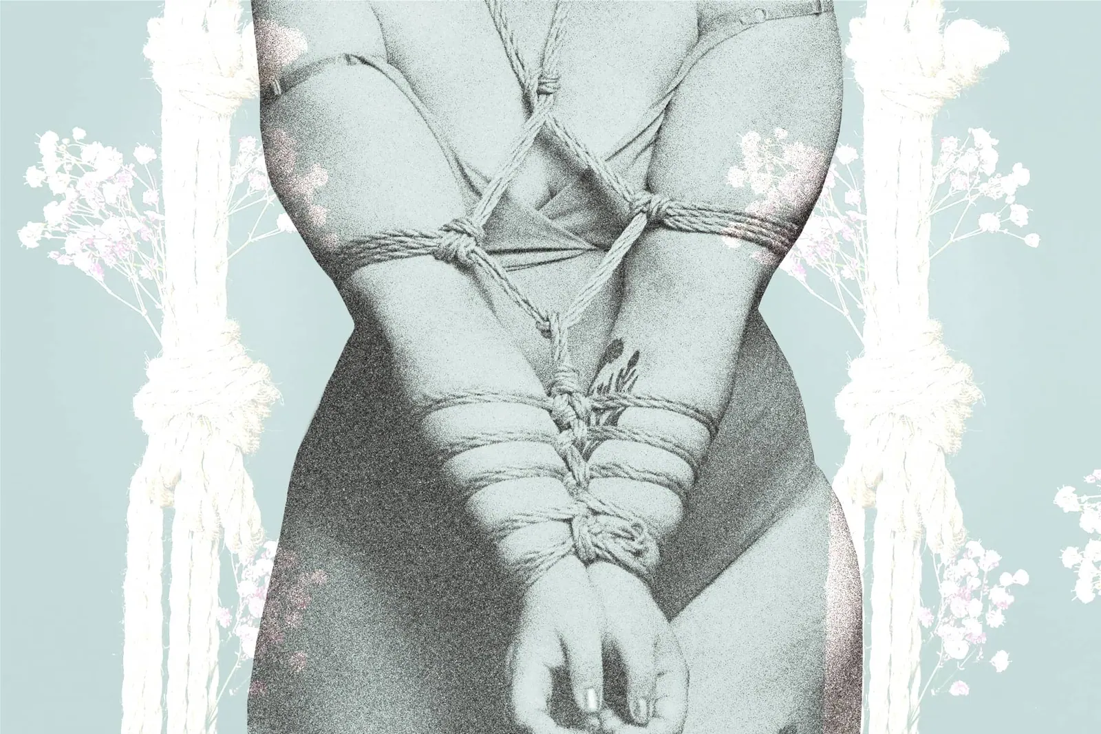 A person tied with an armbinder in the front, set against a soft pink background.