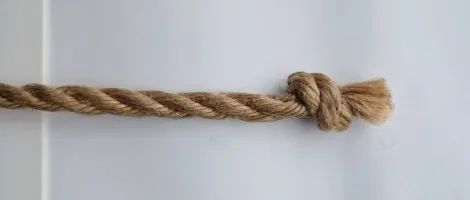 Natural jute rope with a braided stopper knot at the end.