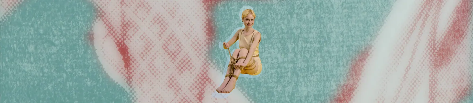 young woman self-tying her legs with a smile on a teal, pink background.